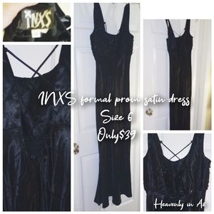 Black satin Prom dress with intriquite sequins on the bust by inxs